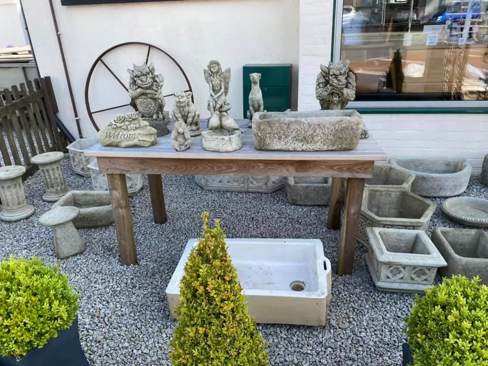 Stone garden items infront of the shop